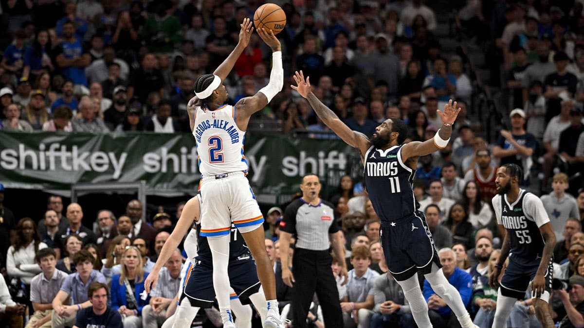 Oklahoma City Thunder guard Shai Gilgeous-Alexander (2) makes a jump shot over Dallas Mavericks guard Kyrie Irving (11) during the second half in game four of the second round for the 2024 NBA playoffs at American Airlines Center.