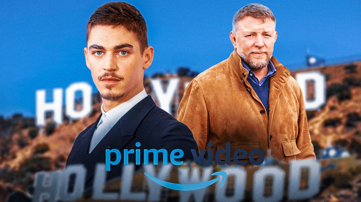 Guy Ritchie and Hero Fiennes Tiffin in front of Hollywood sign.