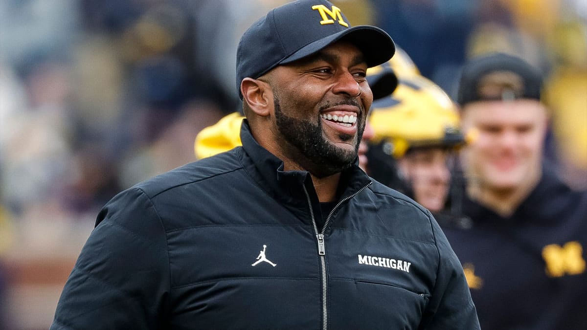 Big Ten conference Michigan football head coach Sherron Moore watches warm up during the spring game
