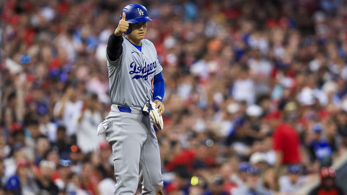 Los Angeles Dodgers designated hitter Shohei Ohtani (17) reacts after a play in the sixth inning against the Cincinnati Reds at Great American Ball Park.