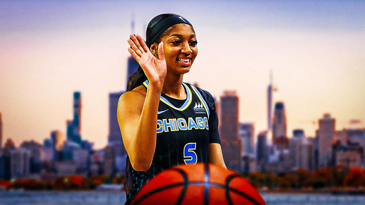 Chicago Sky's Angel Reese smiles while traffic runs in background