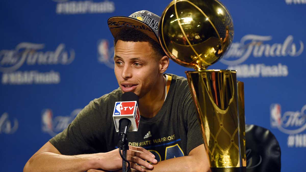 Golden State Warriors guard Stephen Curry (30) talks to the media after beating the Cleveland Cavaliers in game six of the NBA Finals at Quicken Loans Arena.