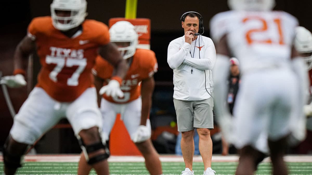 Texas Longhorns Head Coach Steve Sarkisian watches the play in the Longhorns' spring Orange and White game at Darrell K Royal Texas Memorial Stadium