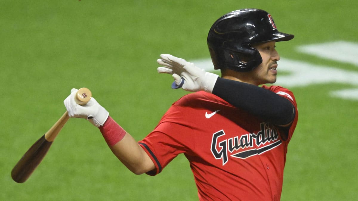 Cleveland Guardians left fielder Steven Kwan (38) singles in the eighth inning against the Los Angeles Angels at Progressive Field.