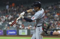 Cleveland Guardians left fielder Steven Kwan (38) bats during the game against the Houston Astros at Minute Maid Park.