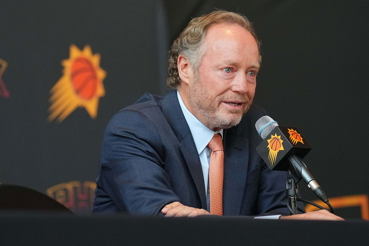 Mike Budenholzer speaks during a press conference to announce his job as head coach of the Phoenix Suns. 