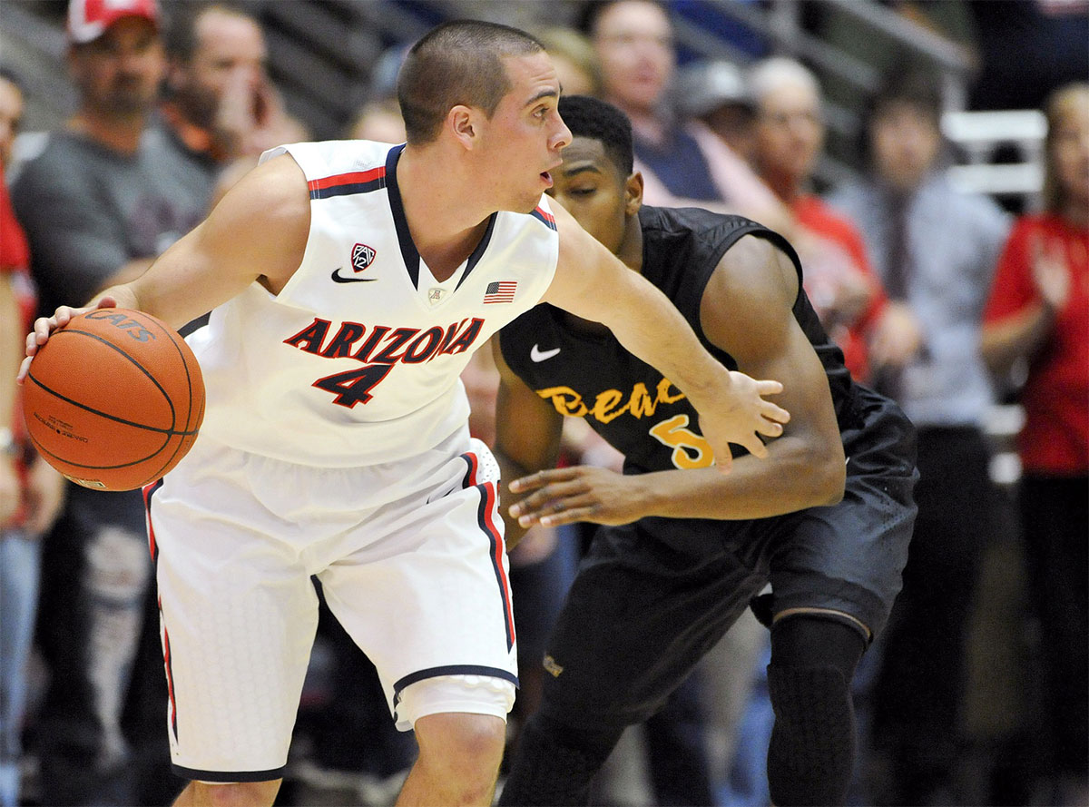 At Wildcats Guard TJ McConnell (4) Dribible Ball as a long country at 49ers Guard Mike Caffei (5) Defend during the first half in McCale Center. 