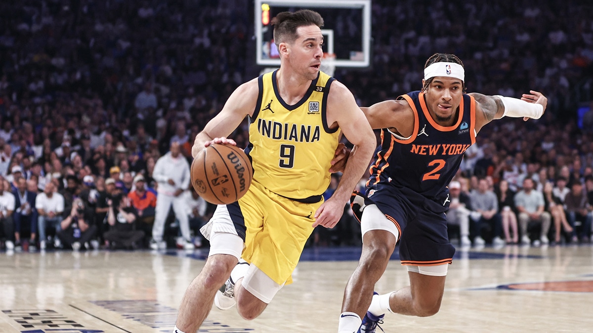 Indiana Pacers guard T.J. McConnell (9) drives past New York Knicks guard Miles McBride (2) in the first quarter during game two of the second round for the 2024 NBA playoffs at Madison Square Garden.