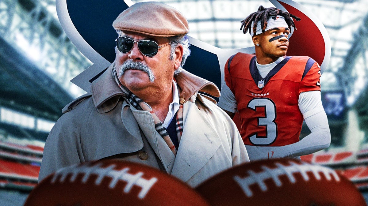 Houston Texans owner Cal McNair with wide receiver Tank Dell. They are next to a logo for the Houston Texans.