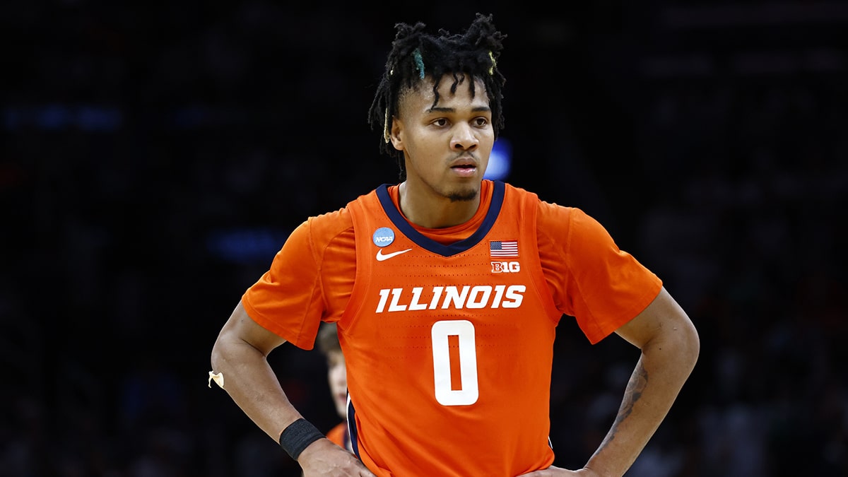 [NBA Draft] Illinois Fighting Illini guard Terrence Shannon Jr. (0) reacts against the Connecticut Huskies in the finals of the East Regional of the 2024 NCAA Tournament at TD Garden. 