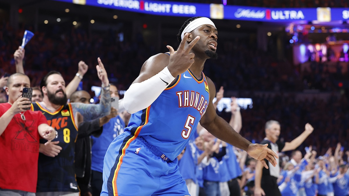Oklahoma City Thunder guard Luguentz Dort (5) gestures after scoring a three-point basket against the Dallas Mavericks during the second quarter of game two of the second round for the 2024 NBA playoffs at Paycom Center.