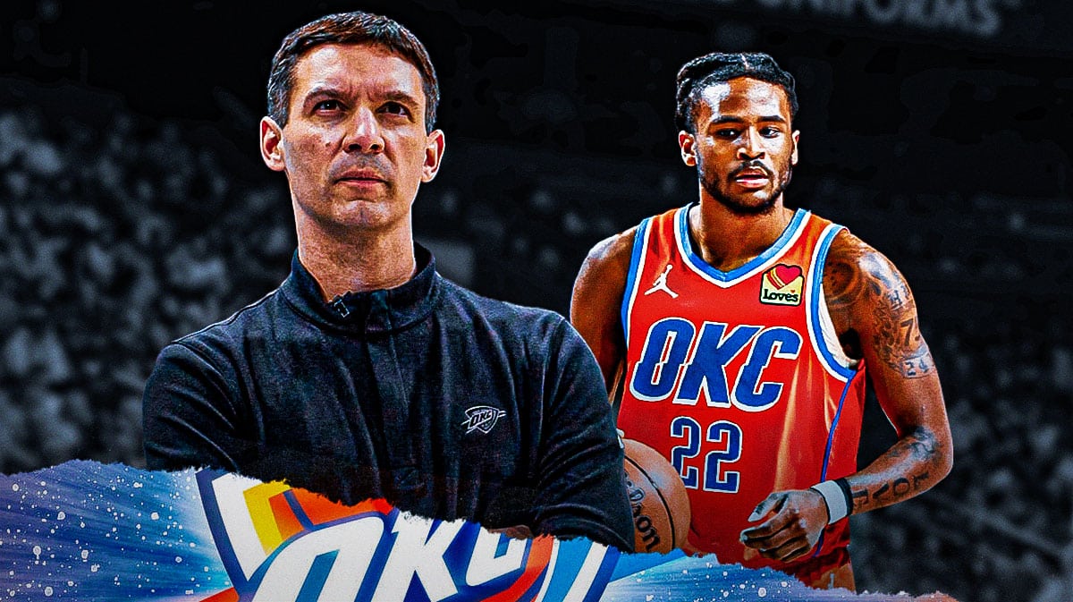 Oklahoma City Thunder Coach mark Daigneault with arms crossed standing next to Thunder guard Cason Wallace.