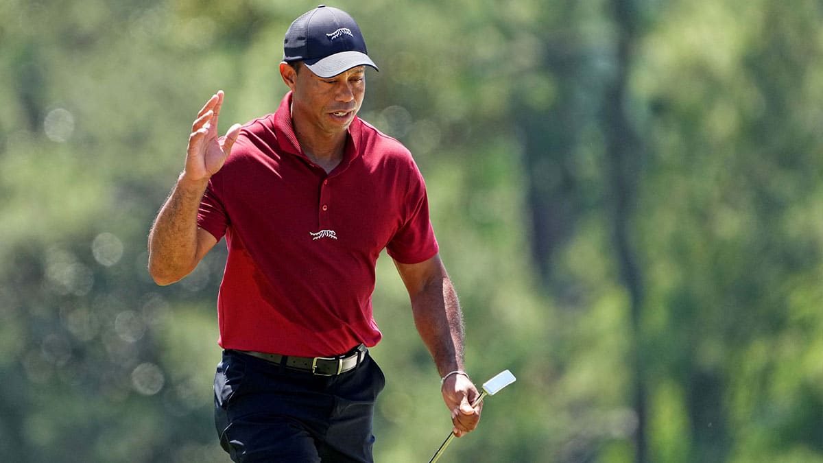 Tiger Woods walks onto the 18th green during the final round of the Masters Tournament.
