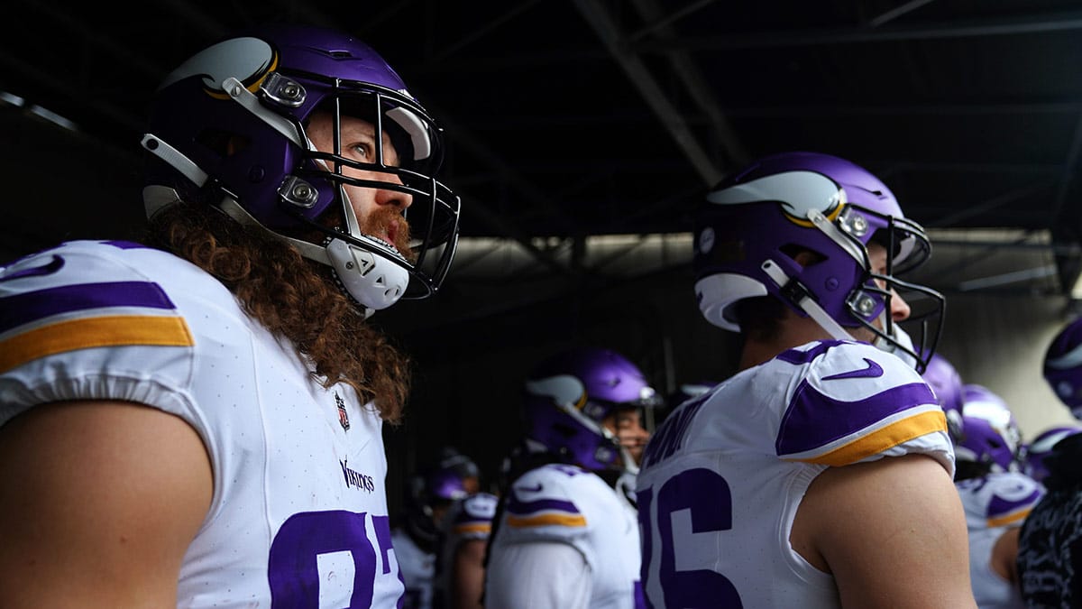 Tight end T.J. Hockenson, left, and the Minnesota Vikings prepare to take the field prior to a game vs. the Cincinnati Bengals