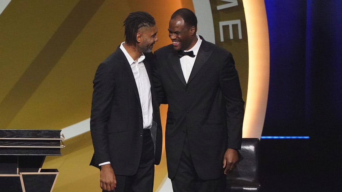 Class of 2020 inductee Tim Duncan (left) with presenter David Robinson (right) during the Naismith Memorial Basketball Hall of Fame Enshrinement ceremony at Mohegan Sun Arena. 