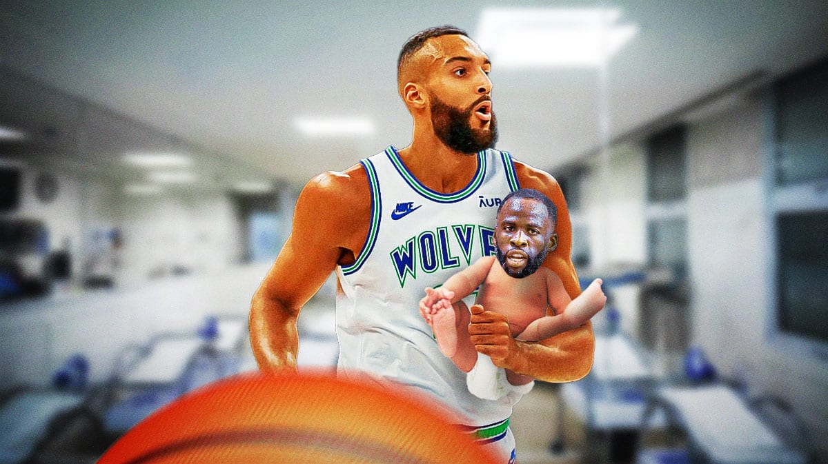 Minnesota Timberwolves player Rudy Gobert and Golden State Warriors player Draymond Green's face on a baby