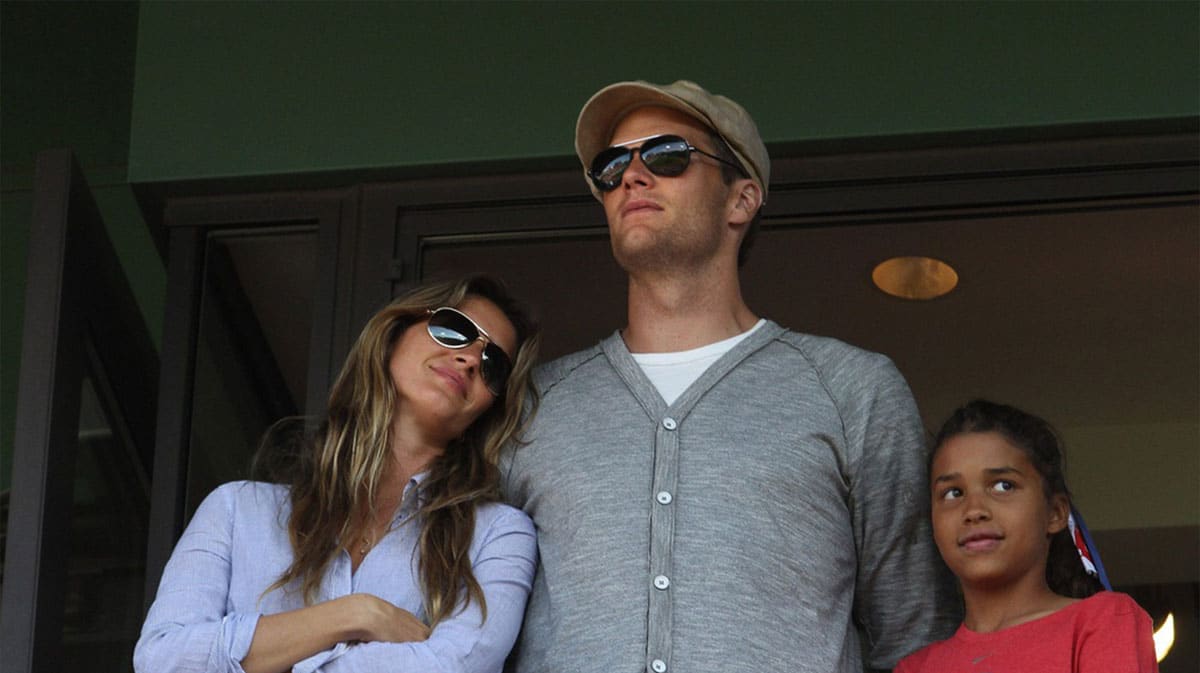 Tom Brady and his wife Gisele Bundchen look out over Fenway during the 7th inning stretch.