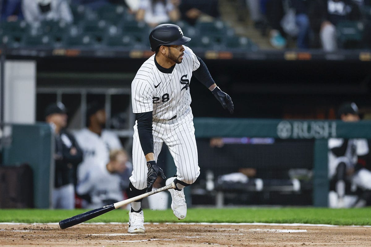 Chicago White Sox outfielder Tommy Pham (28) hits an RBI-single against the Cleveland Guardians during the second inning at Guaranteed Rate Field.