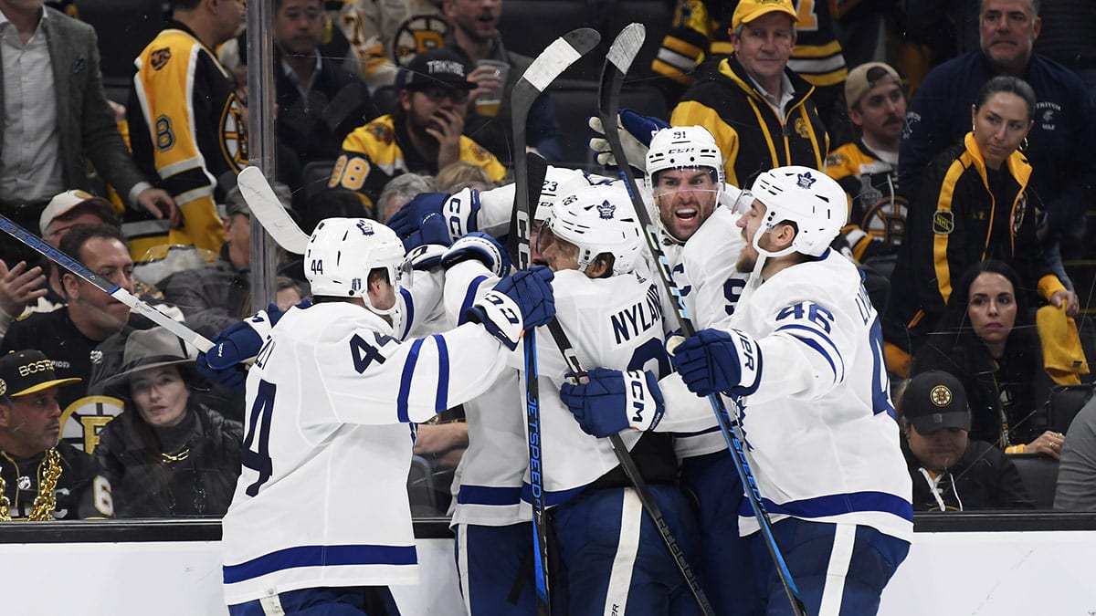 The Toronto Maple Leafs celebrate their overtime win over the Boston Bruins in game five of the first round of the 2024 Stanley Cup Playoffs at TD Garden.