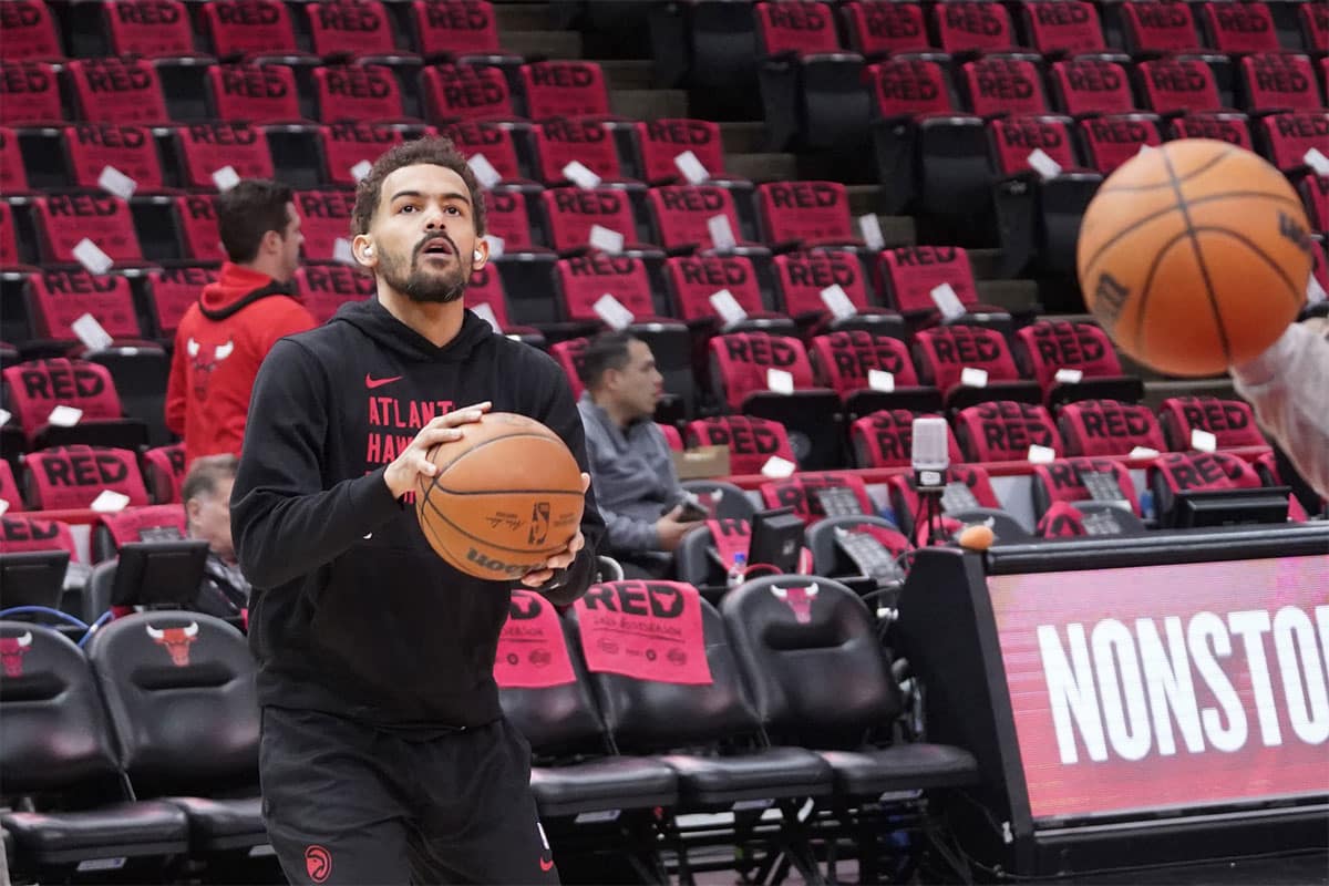 Atlanta Hawks guard Trae Young (11) warms up before a play-in game of the 2024 NBA playoffs against the Chicago Bulls at United Center.