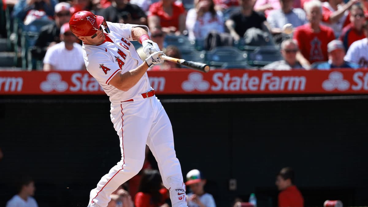 Los Angeles Angels designated hitter Mike Trout (27) hits a home run during the sixth inning against the Baltimore Orioles at Angel Stadium.