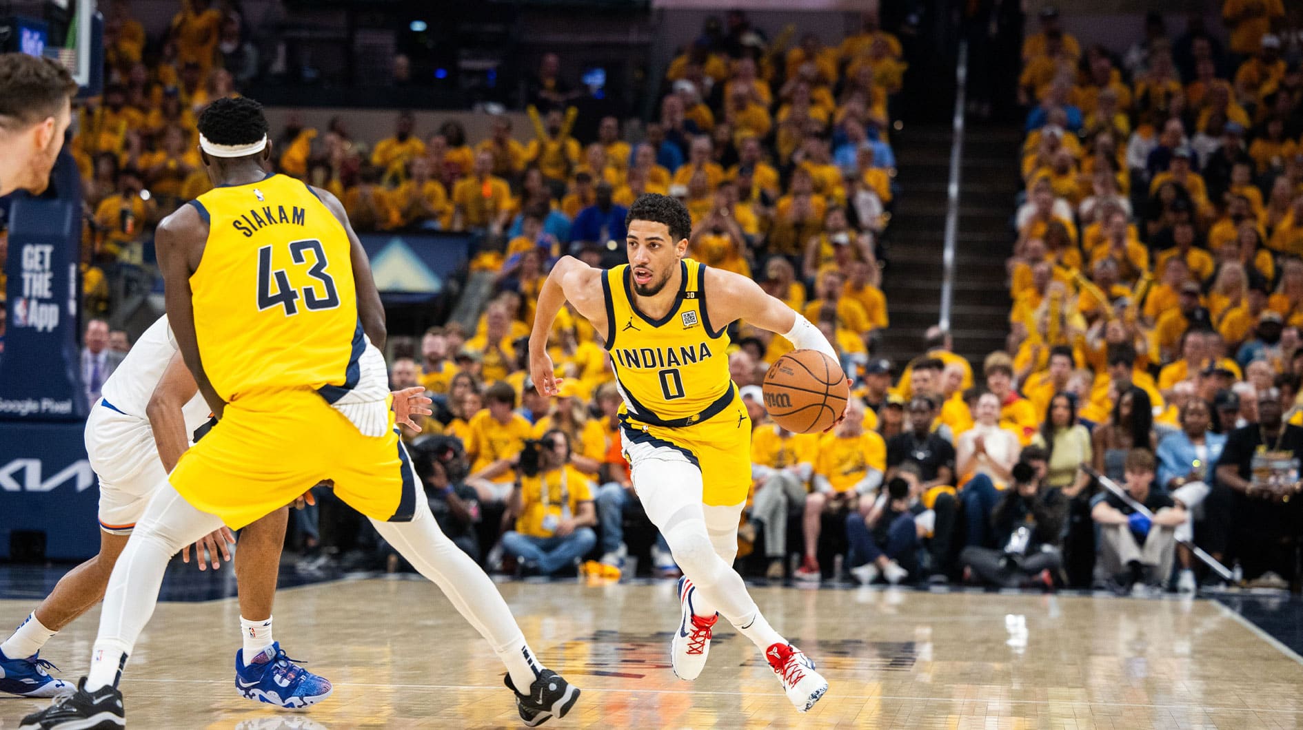 Indiana Pacers guard Tyrese Haliburton (0) dribbles the ball during game six of the second round for the 2024 NBA playoffs against the New York Knicks at Gainbridge Fieldhouse