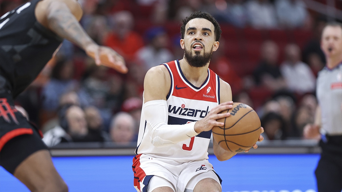 Washington Wizards guard Tyus Jones (5) pulls up to shoot the ball during the third quarter against the Houston Rockets at Toyota Center.