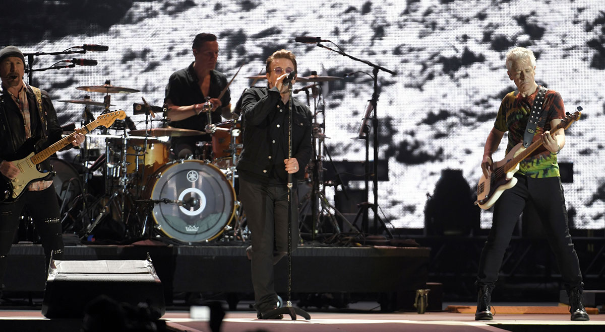 U2 members Bono, The Edge, Larry Mullen Jr. and Adam Clayton performing at the 2017 Bonnaroo Festival.