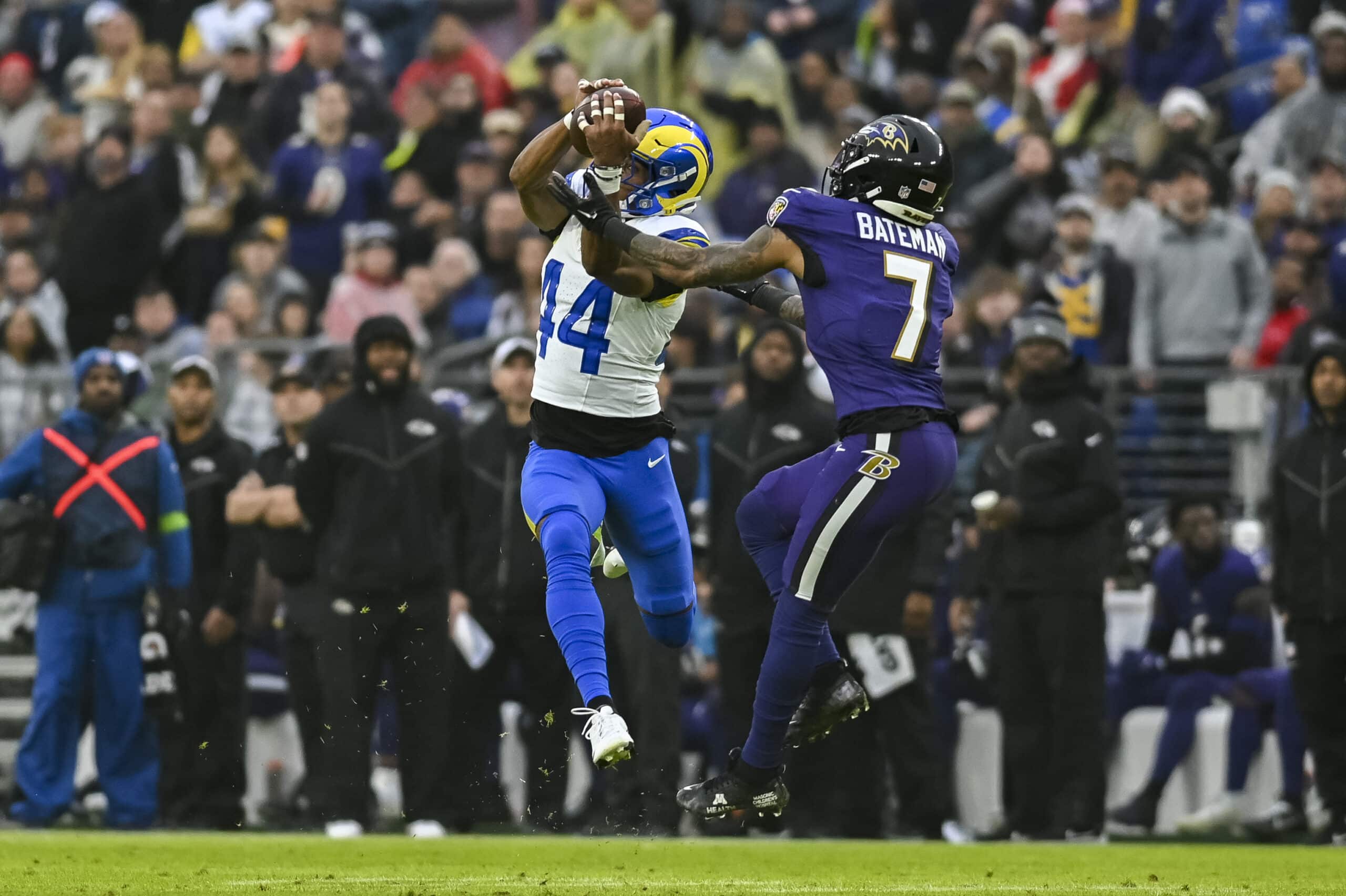 Dec 10, 2023; Baltimore, Maryland, USA; Los Angeles Rams cornerback Ahkello Witherspoon (44) intercepts a pass intended for Baltimore Ravens wide receiver Rashod Bateman (7) during the first half during the at M&T Bank Stadium. 