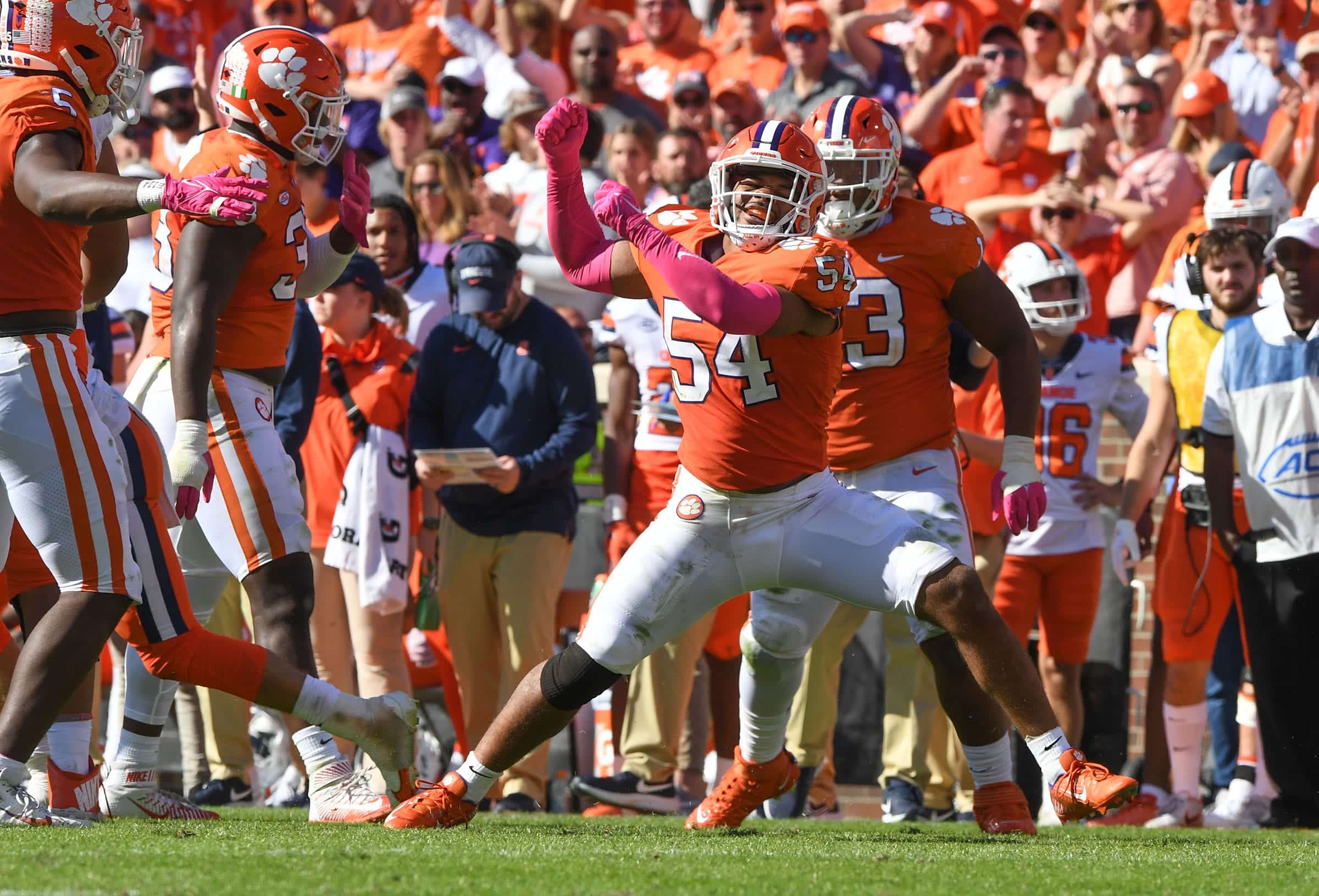 Clemson linebacker Jeremiah Trotter Jr. (54) celebrates tackling Syracuse quarterback Garrett Shrader (6) during the fourth quarter at Memorial Stadium in Clemson, S.C., on Oct. 22, 2022.