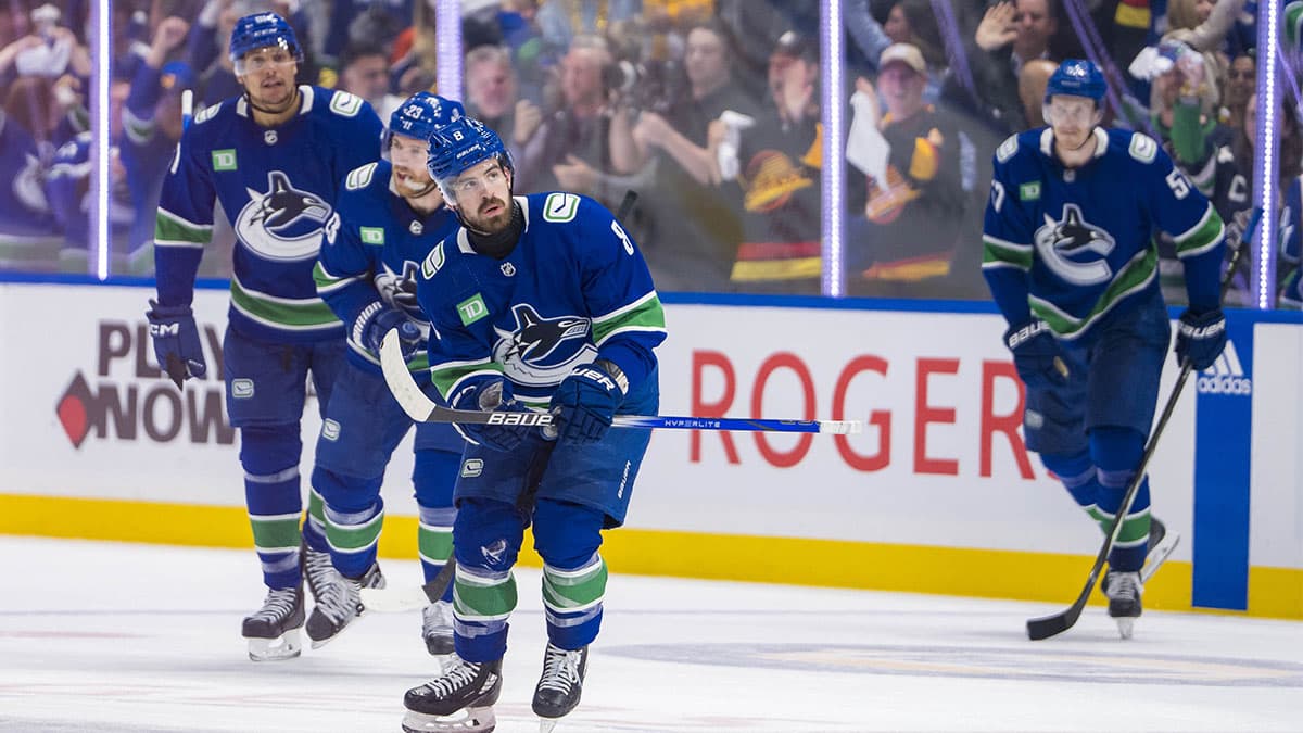 Vancouver Canucks forward Dakota Joshua (81) and defenseman Carson Soucy (7) and forward Conor Garland (8) and defenseman Tyler Myers (57) and forward Elias Lindholm (23) celebrate Garland’s game winning goal against the Edmonton Oilers during the third period in game one of the second round of the 2024 Stanley Cup Playoffs at Rogers Arena.