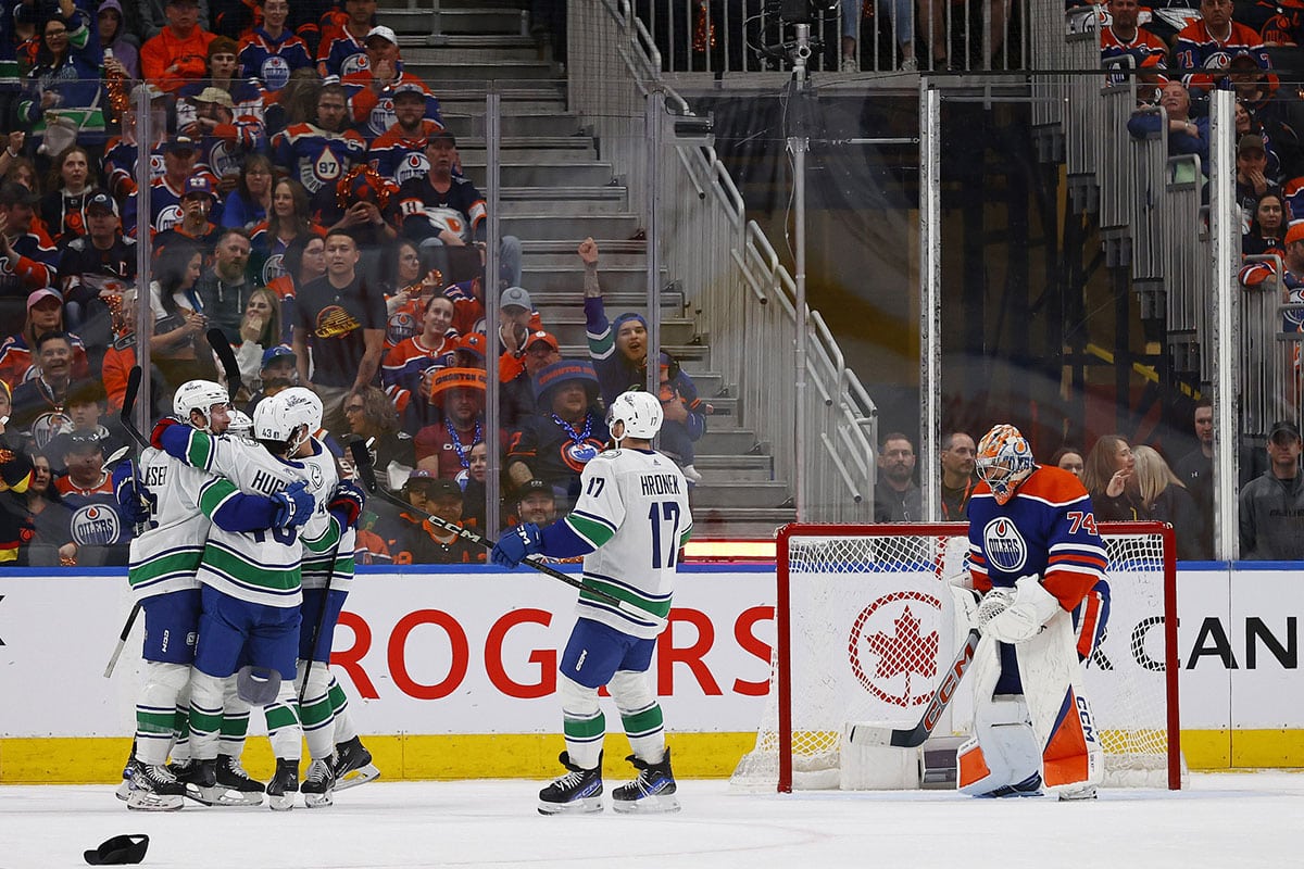 The Vancouver Canucks celebrate a goal by forward Brock Boeser (6), his third goal of the game during the first period against the Edmonton Oilers in game three of the second round of the 2024 Stanley Cup Playoffs at Rogers Place.