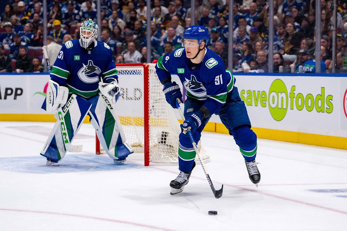 Vancouver Canucks goalie Arturs Silvos (31) watches as defenseman Nikita Zadorov (91) handles the puck against the Edmonton Oilers during the second period in game five of the second round of the 2024 Stanley Cup Playoffs at Rogers Arena.