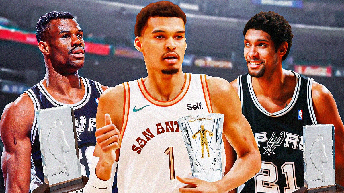 Spurs' Victor Wembanyama, Tim Duncan, David Robinson with Rookie of the Year trophies