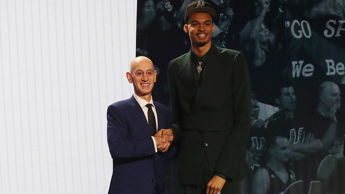 Victor Wembanyama poses for photos with NBA commissioner Adam Silver after being selected first by the San Antonio Spurs in the first round of the 2023 NBA Draft at Barclays Arena. 