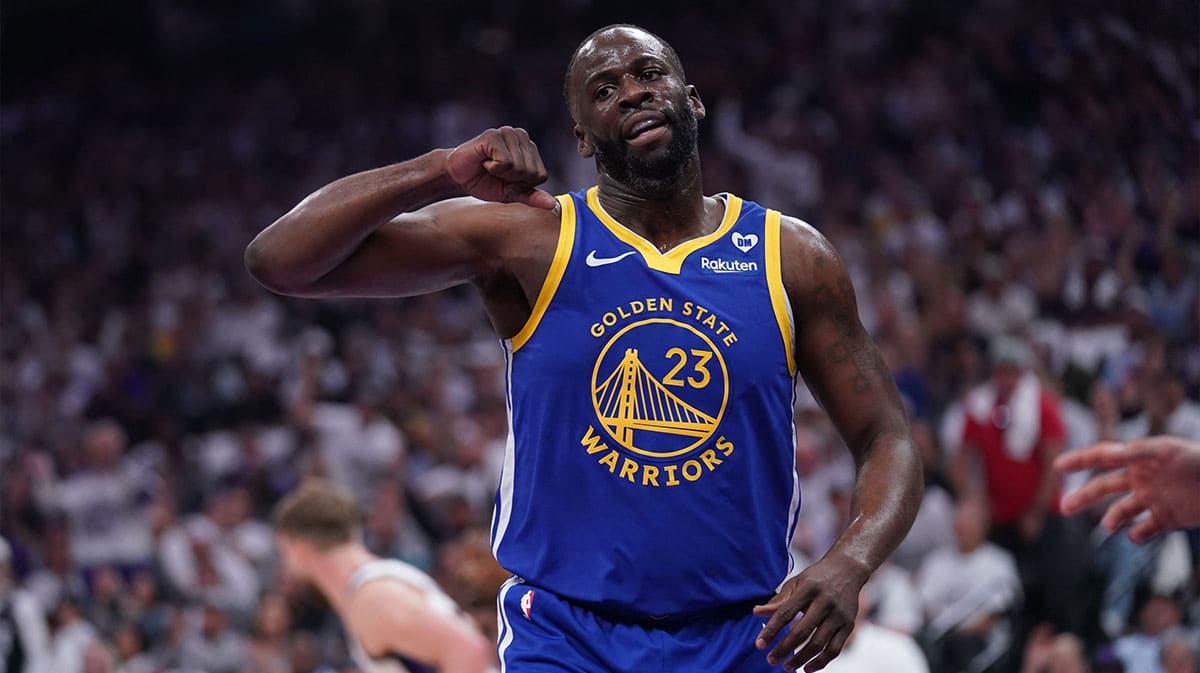 Golden State Warriors forward Draymond Green (23) reacts after a play against the Sacramento Kings in the first quarter during a play-in game of the 2024 NBA playoffs at the Golden 1 Center.