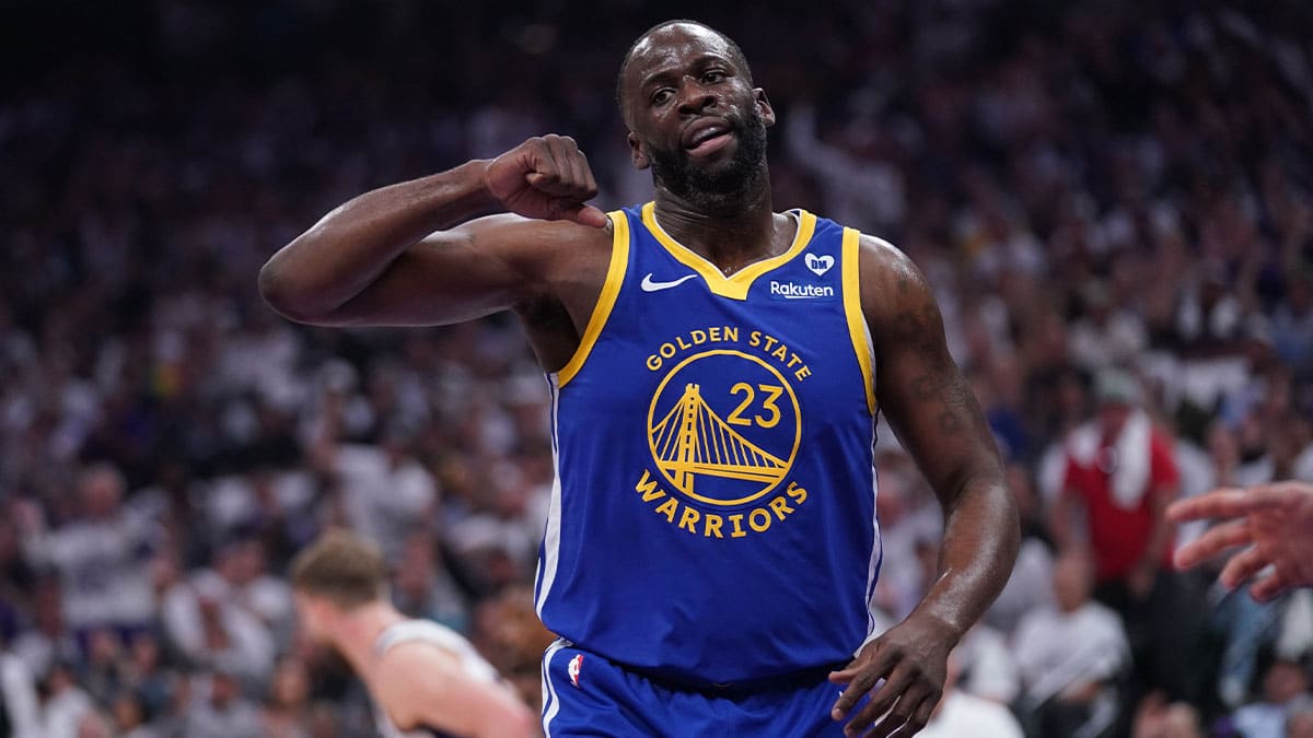 Golden State Warriors forward Draymond Green (23) reacts after a play against the Sacramento Kings in the first quarter during a play-in game of the 2024 NBA playoffs at the Golden 1 Center.