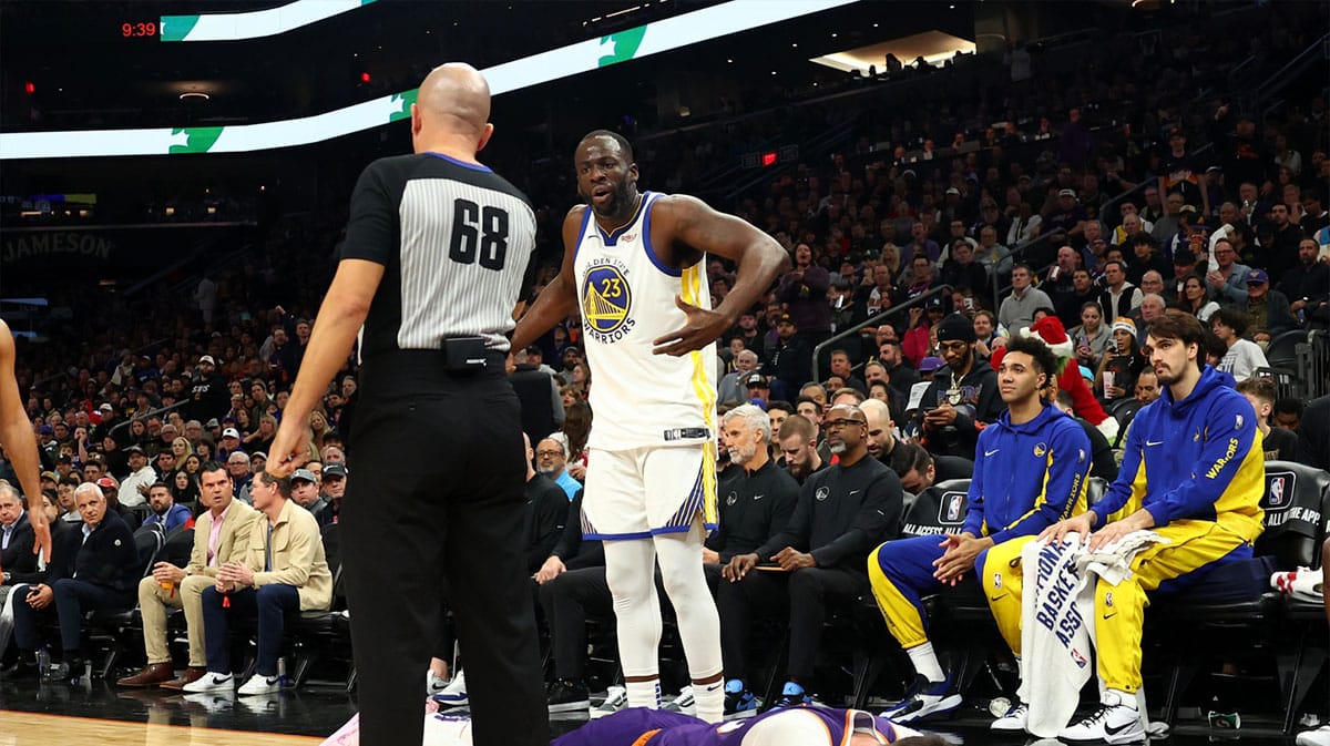 Warriors forward Draymond Green (23) reacts after being called for a foul on Phoenix Suns center Jusuf Nurkic (20)