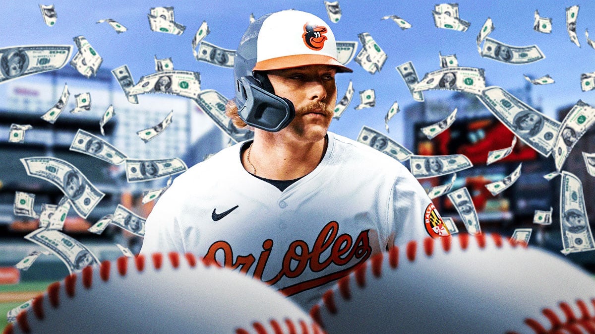Orioles Gunnar Henderson with money surrounding him