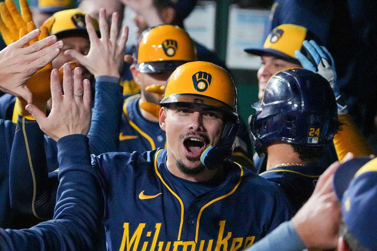 Milwaukee Brewers shortstop Willy Adames (27) celebrates in the dugout against the Kansas City Royals after hitting a three run home run in the ninth inning at Kauffman Stadium.