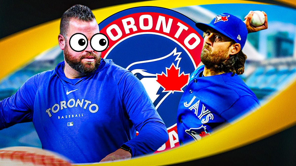 Blue Jays John Schneider with emoji eyes looking at Kevin Gausman