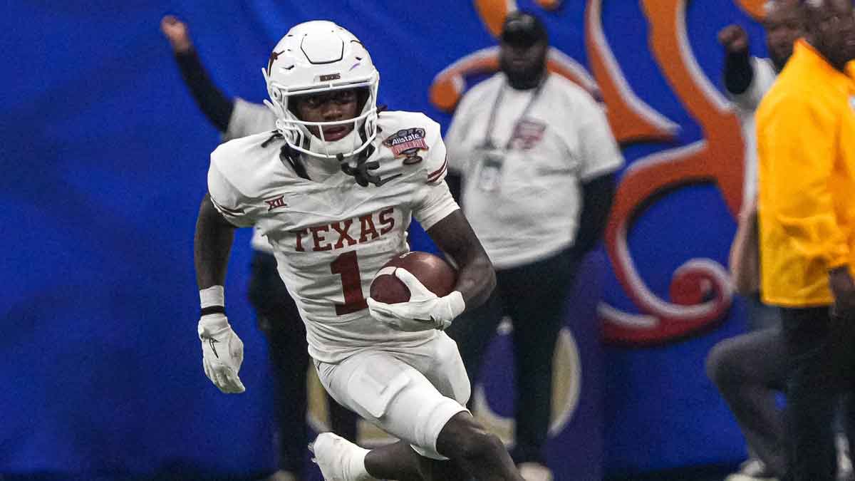 Texas Longhorns wide receiver Xavier Worthy (1) runs the ball during the Sugar Bowl College Football Playoff semifinals game against the Washington Huskies at the Caesars Superdome on Monday, Jan. 1, 2024 in New Orleans, Louisiana.