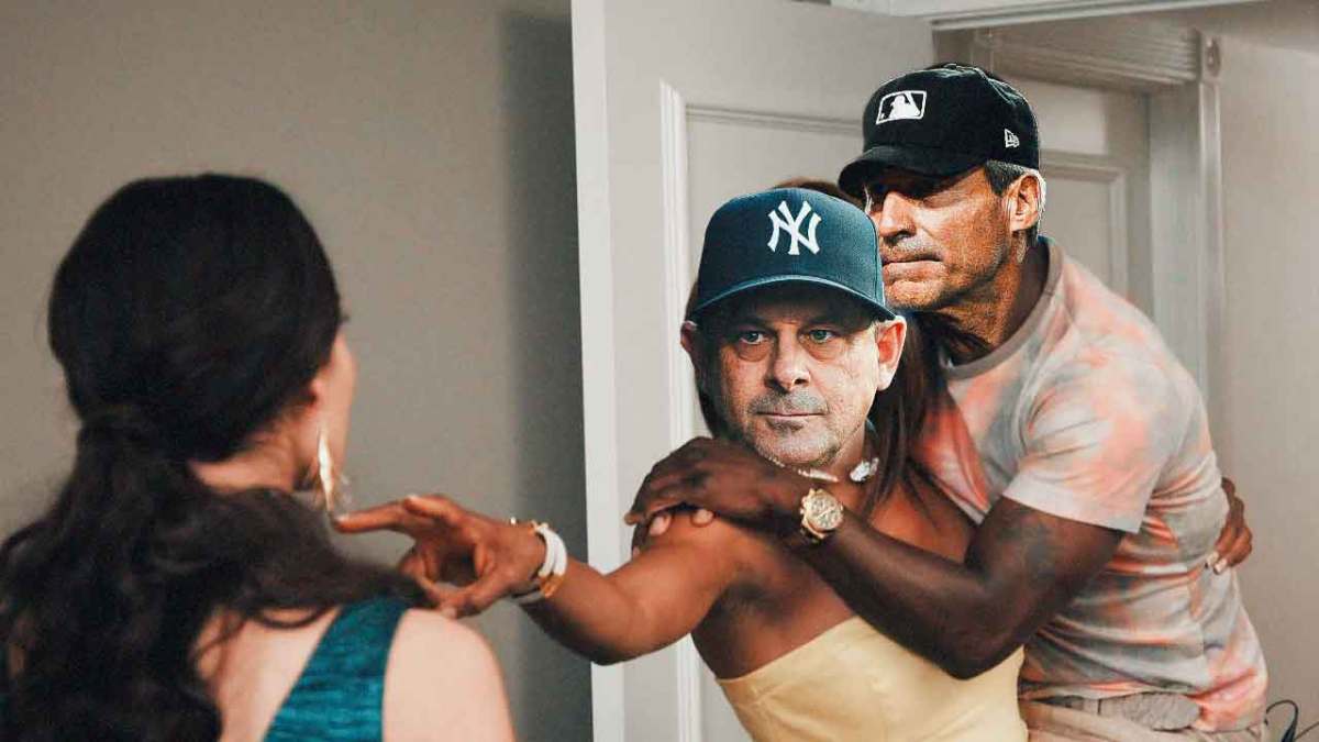 Aaron Boone (Yankees MANAGER) as the woman in yellow and Angel Hernandez (MLB umpire) as Kevin Hart