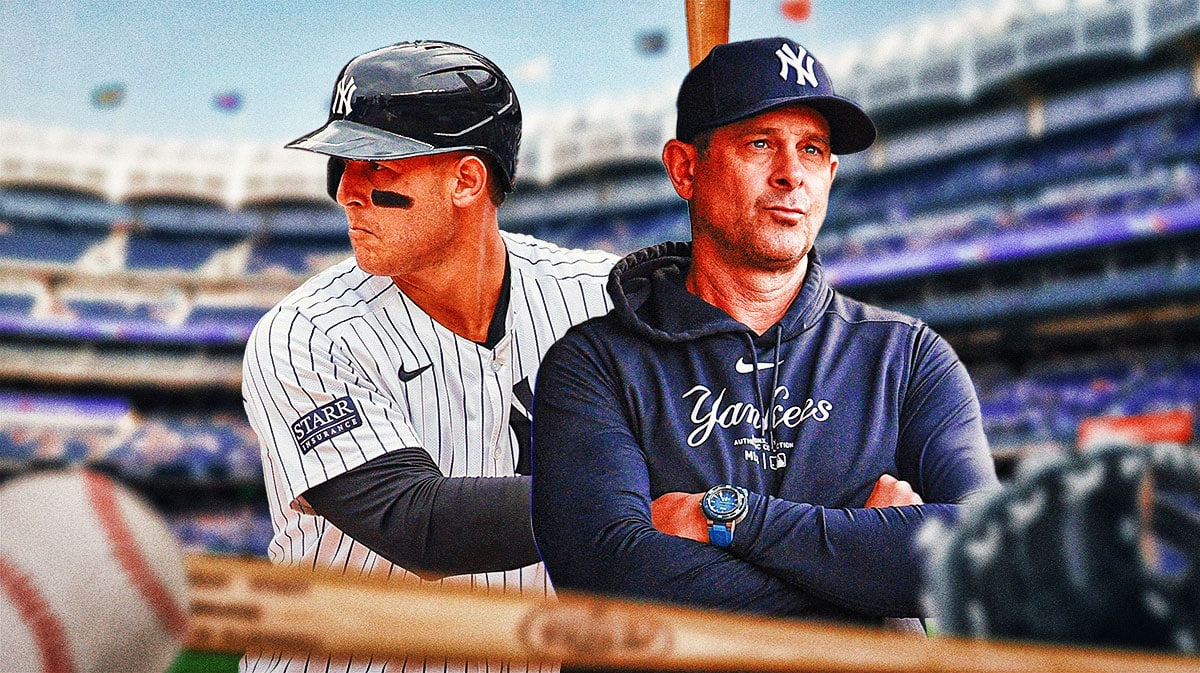 Anthony Rizzo and Aaron Boone with Yankee Stadium in background