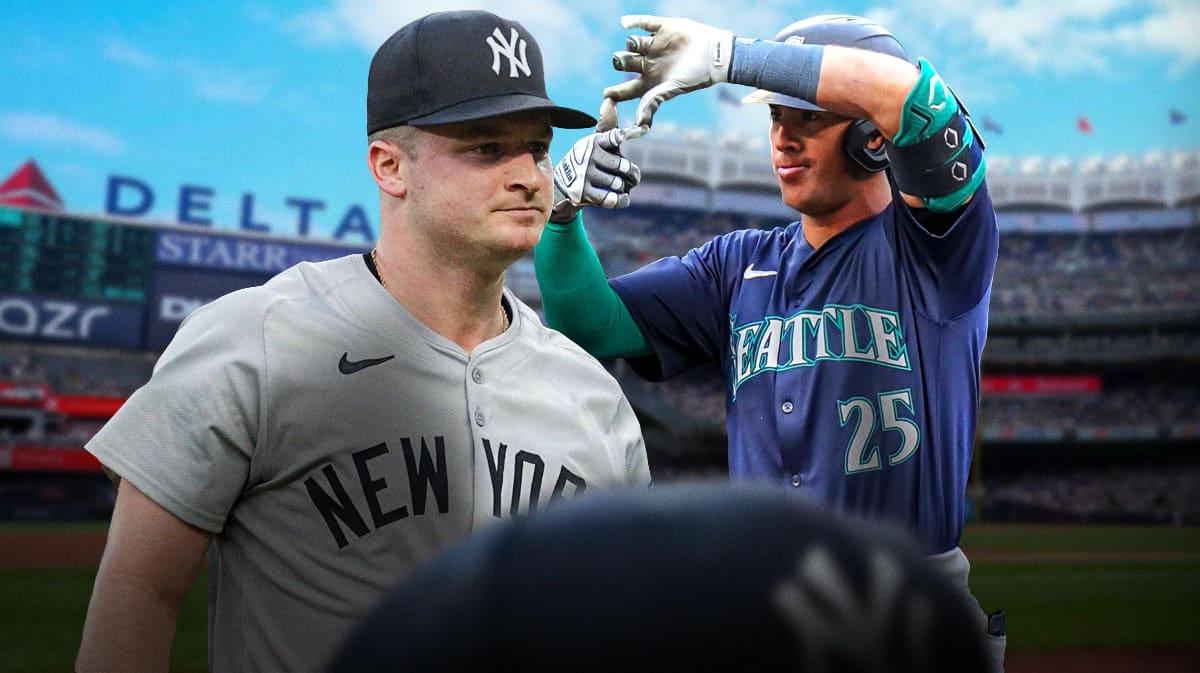 Clarke Schmidt and Dylan Moore with Yankee Stadium in background