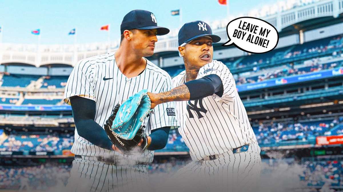 Marcus Stroman with his arm around Clay Holmes saying "leave my boy alone!"