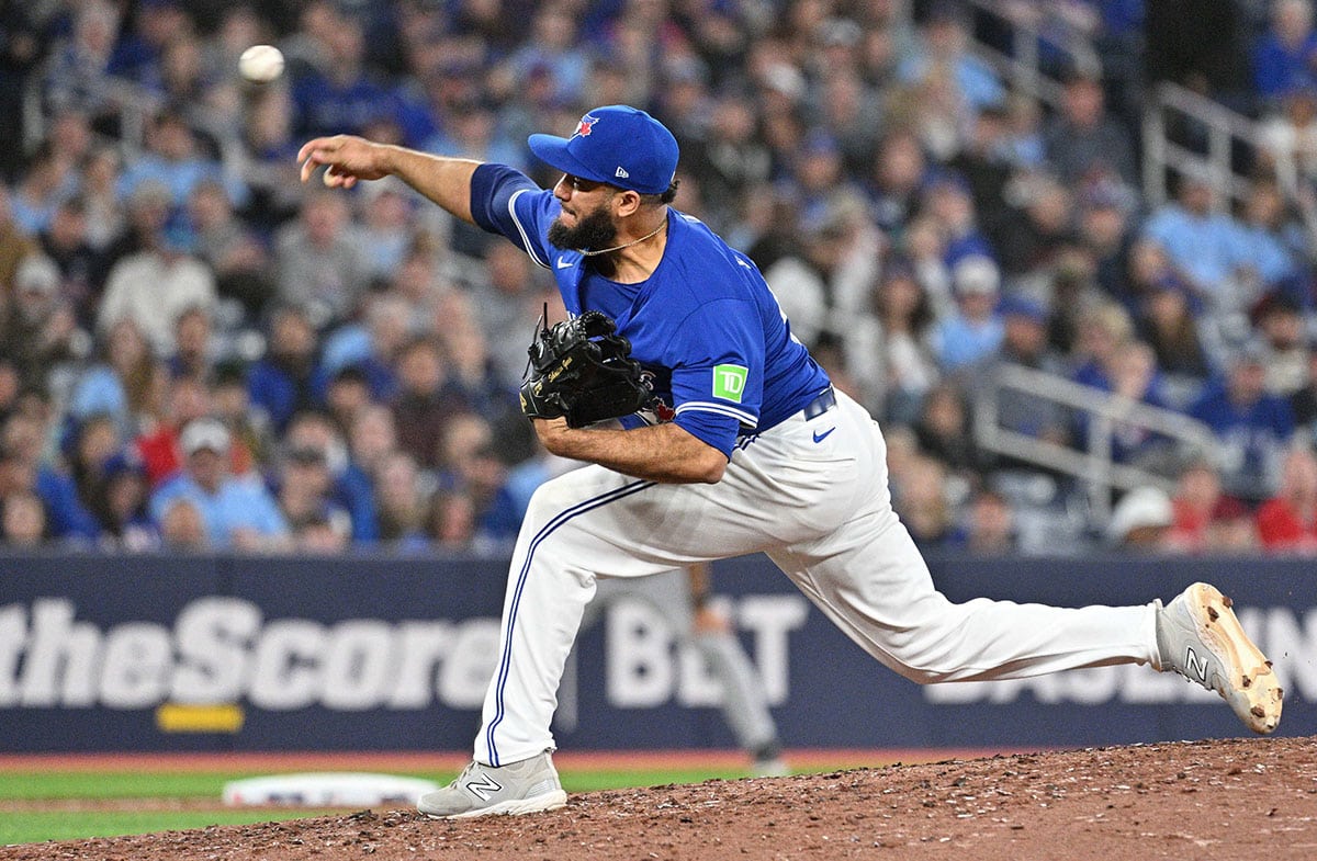 Toronto Blue Jays relief pitcher Yimi Garcia (93) delivers a pitch against the Colorado Rockies in the ninth inning at Rogers Centre