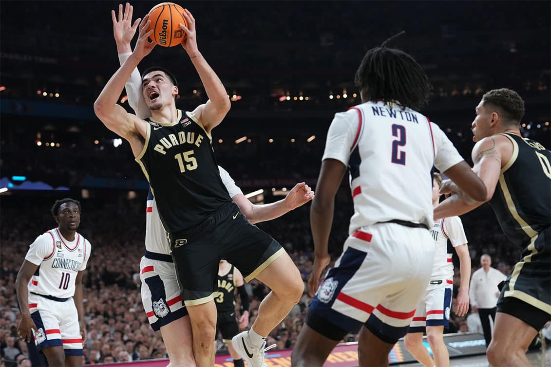 Purdue Boilermakers center Zach Edey (15) attempts a shot during the Men's NCAA national championship game against the Connecticut Huskies at State Farm Stadium in Glendale on April 8, 2024.