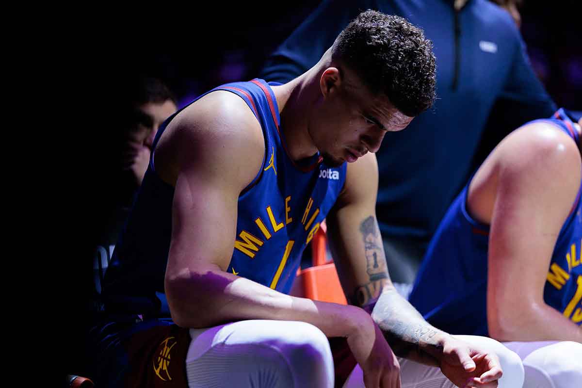 Denver Nuggets forward Michael Porter Jr. (1) sits during a timeout during