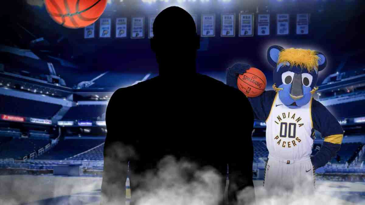 Silhouette of action shot of Jalen Smith (Pacers) with Pacers Mascot in the background